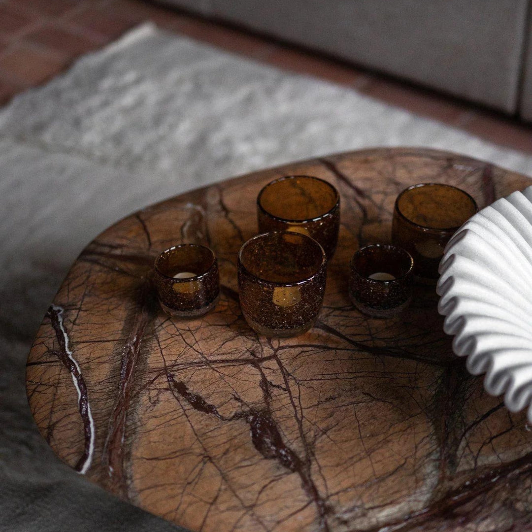 Brown marble coffee table with minimalist aesthetic