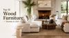 Living room with beige sofa, fireplace, and wooden coffee table.