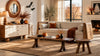 Modern Halloween-themed living room with cozy furniture and autumn decor.