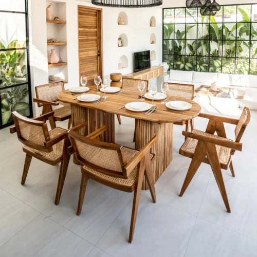 Handcrafted wooden dining table set with matching chairs